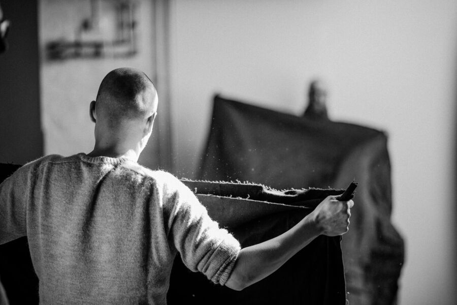 Documentary black-and-white photo of a person working